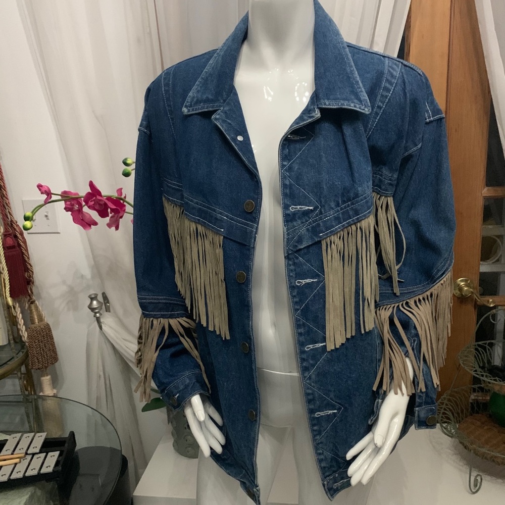 Cowboy fringe denim jacket by JouJou.